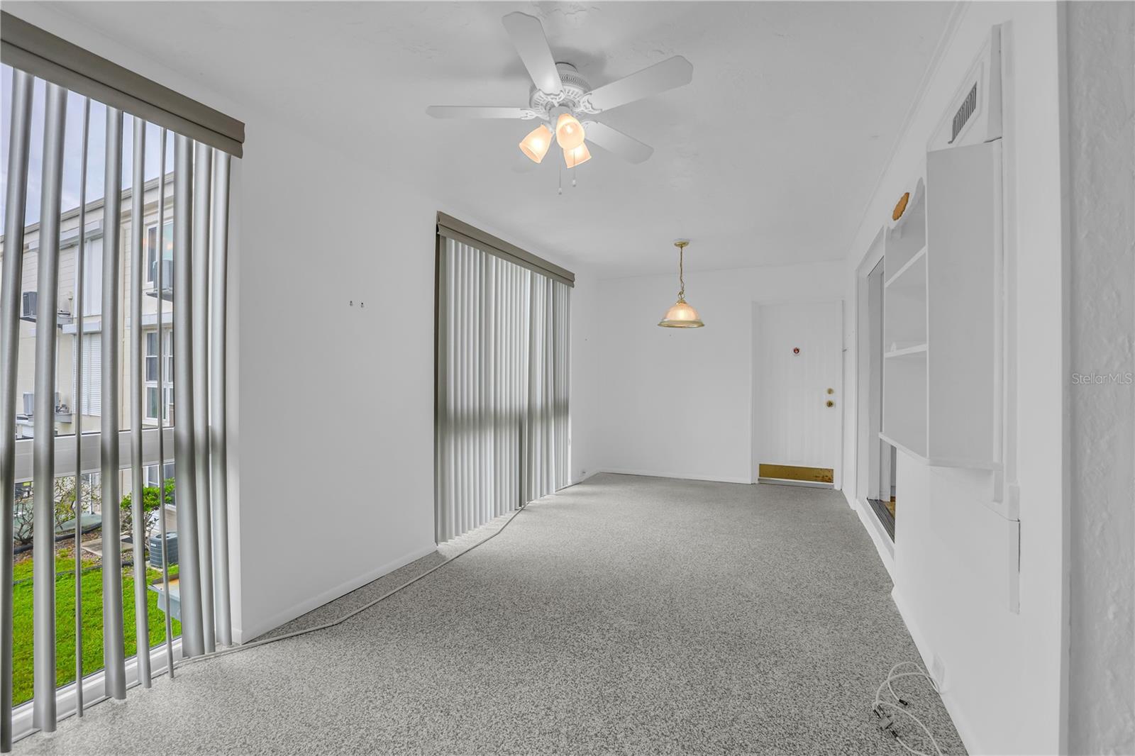Sunroom with rear access to breezeway