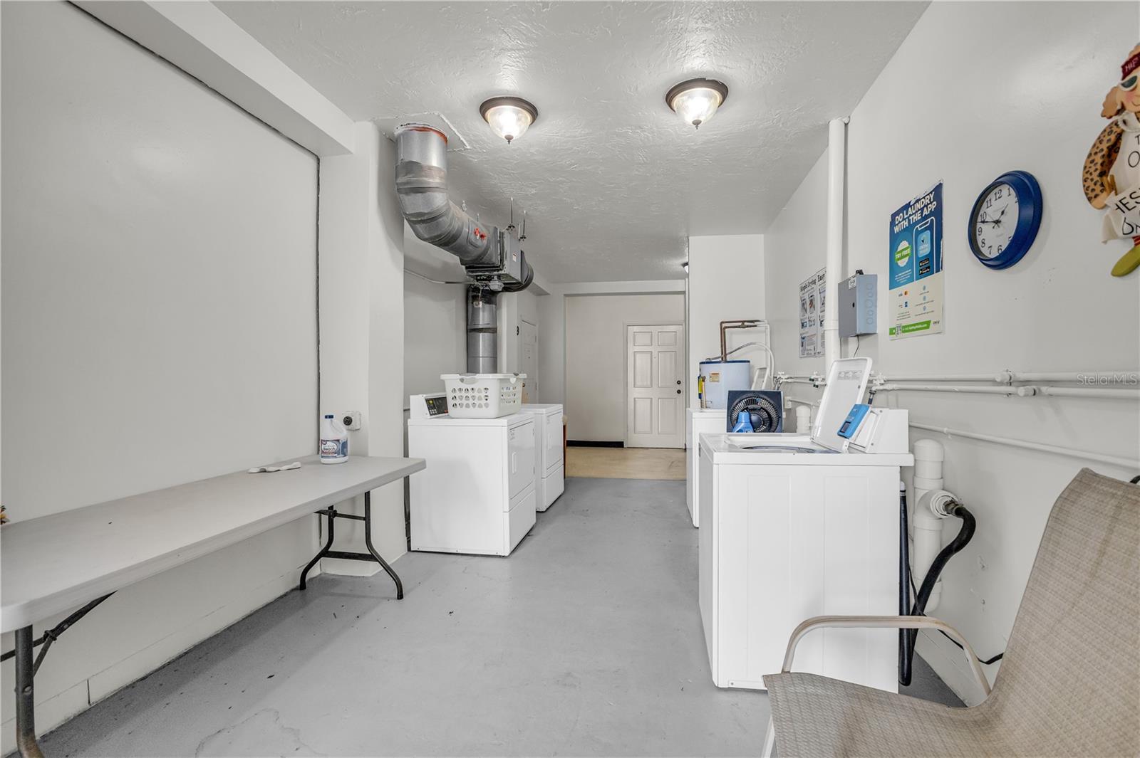 Community laundry area adjacent to unit.
