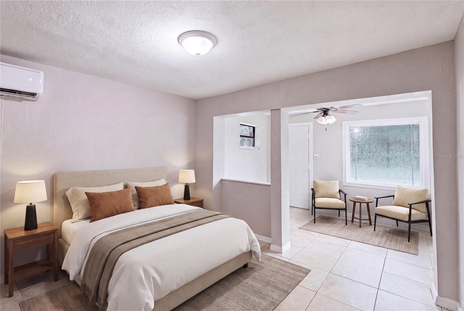 side bedroom with separate entry door