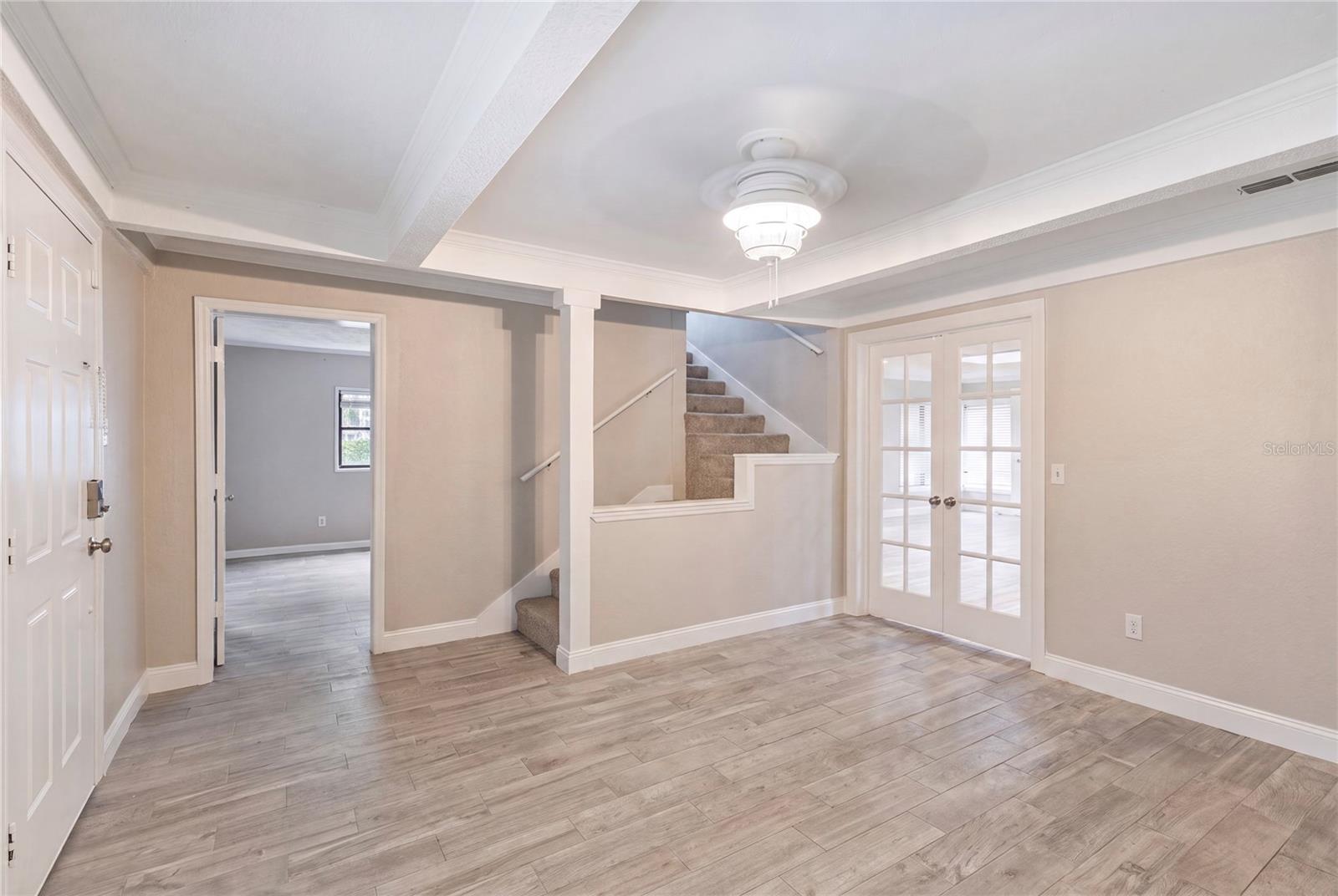 front entry room could be an office, dining room or 2nd living space for gaming.