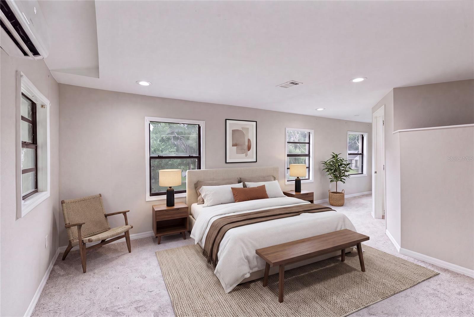 Large upstairs bedroom with 2 walk in closets and updated bathroom