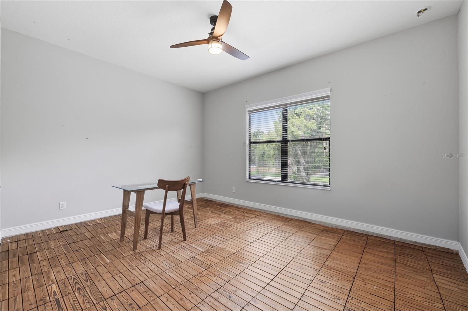 Expansive Corner Bedroom with Walk-In Closet