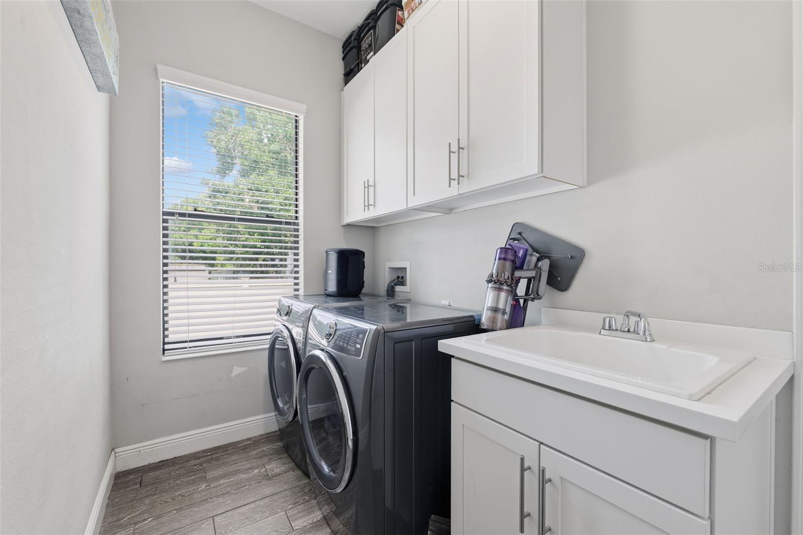 Dedicated Laundry Space with Utility Sink & Storage
