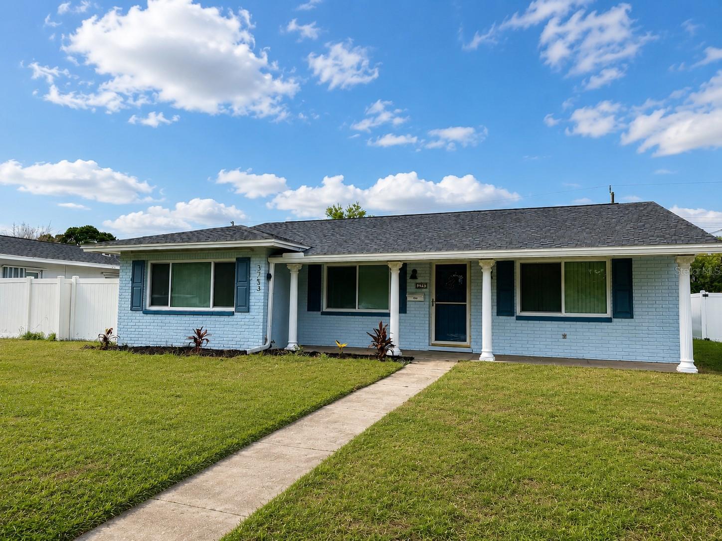 Enjoy the comfort & charm of this beautiful residence, showcasing inviting curb appeal & a warm welcome from the moment you arrive.