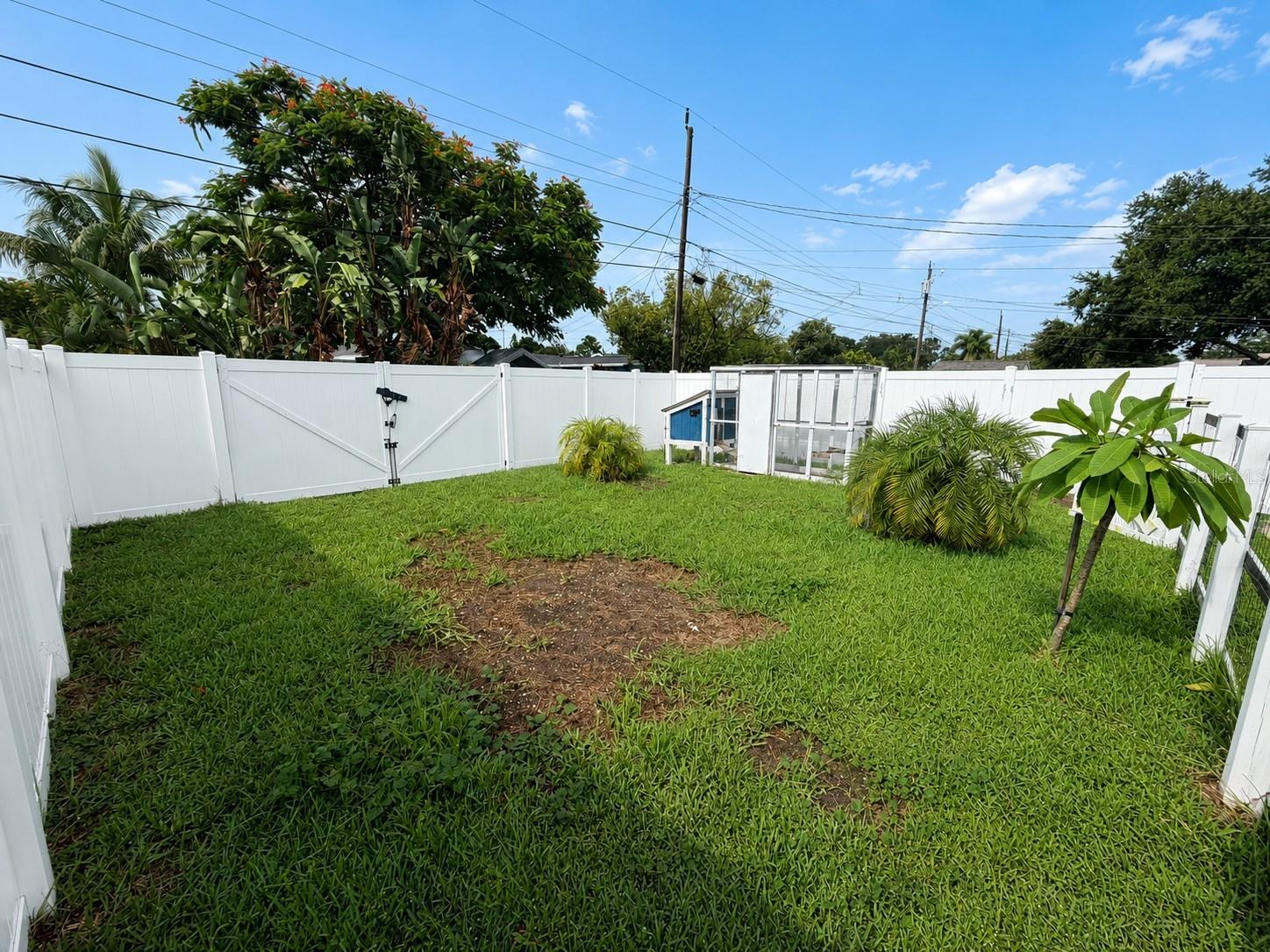 The wide rear gates & alley access provide exceptional flexibility for secure backyard storage of an RV, boat, trailer, or additional vehicles.
