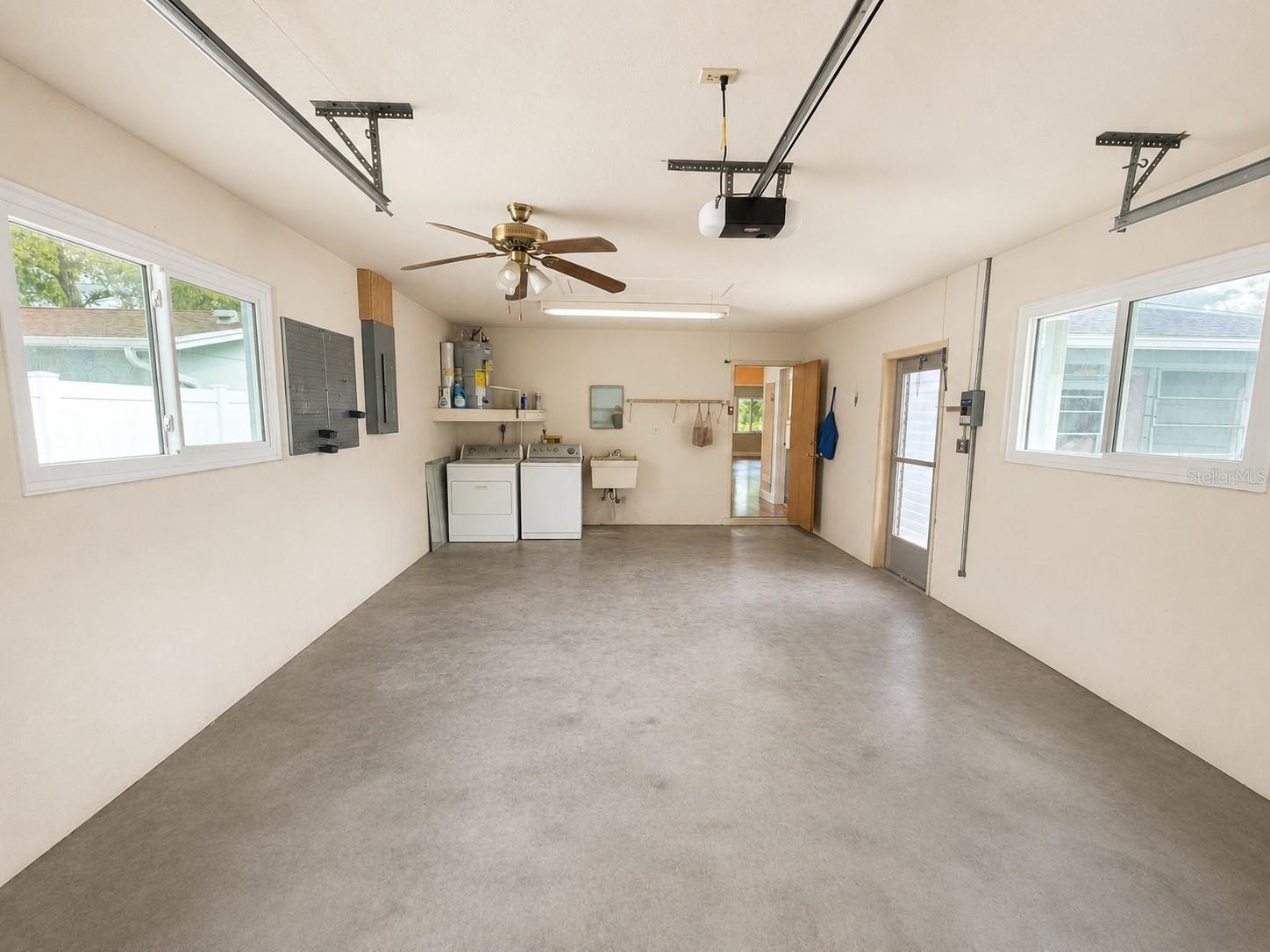 The washer and dryer are located in the garage.