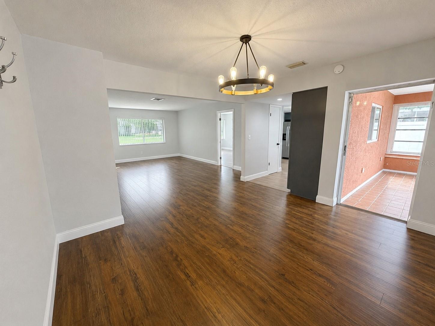 Beautiful, gleaming floors enhance the living and dining rooms.