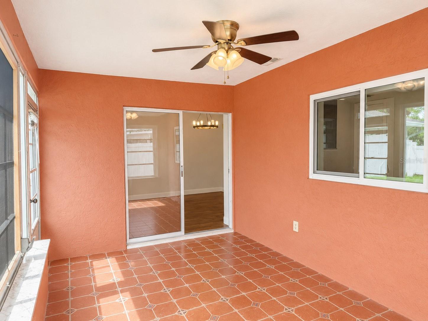 The Florida room features lovely tile flooring, screened windows & approxinately 160 sq.ft.of space.  This room is NOT included in the livable square feet of the home.