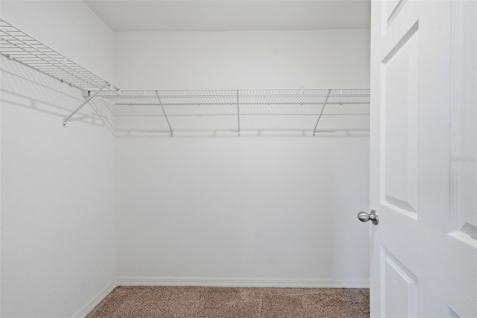 Excellent size primary bedroom closet