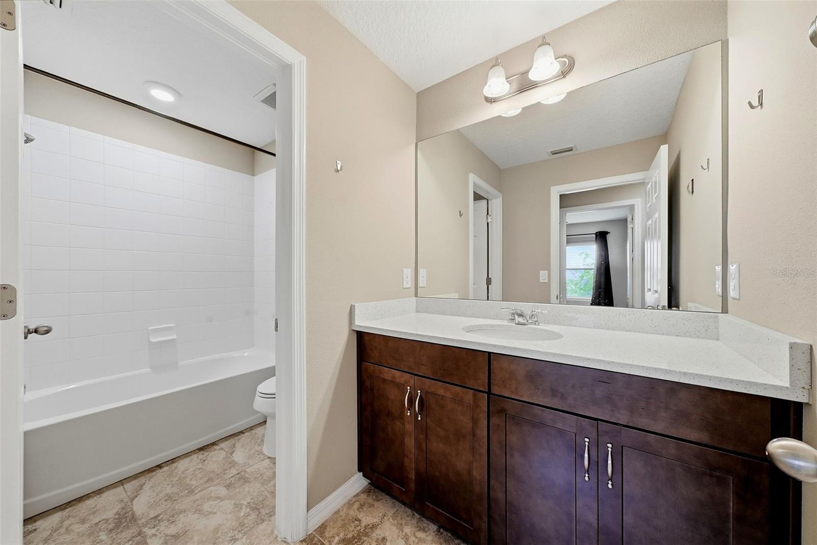 Nice 2nd. bathroom, lots of counter space and a separated tub