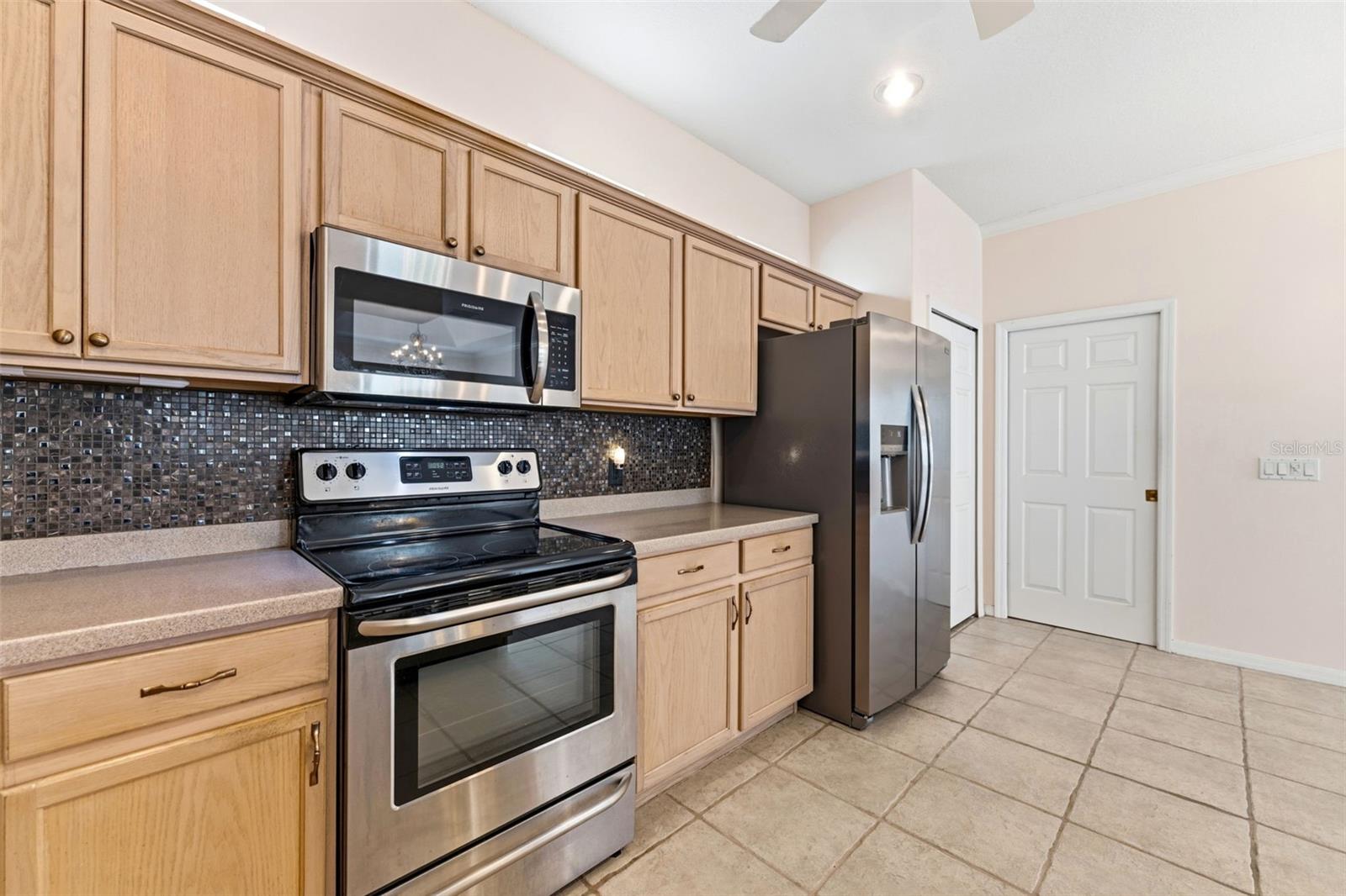 The stainless steel range and microwave oven.