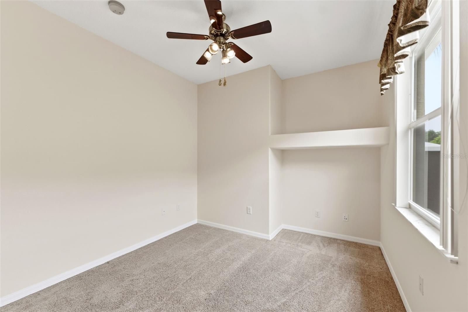 Great natural light in the second bedroom too!