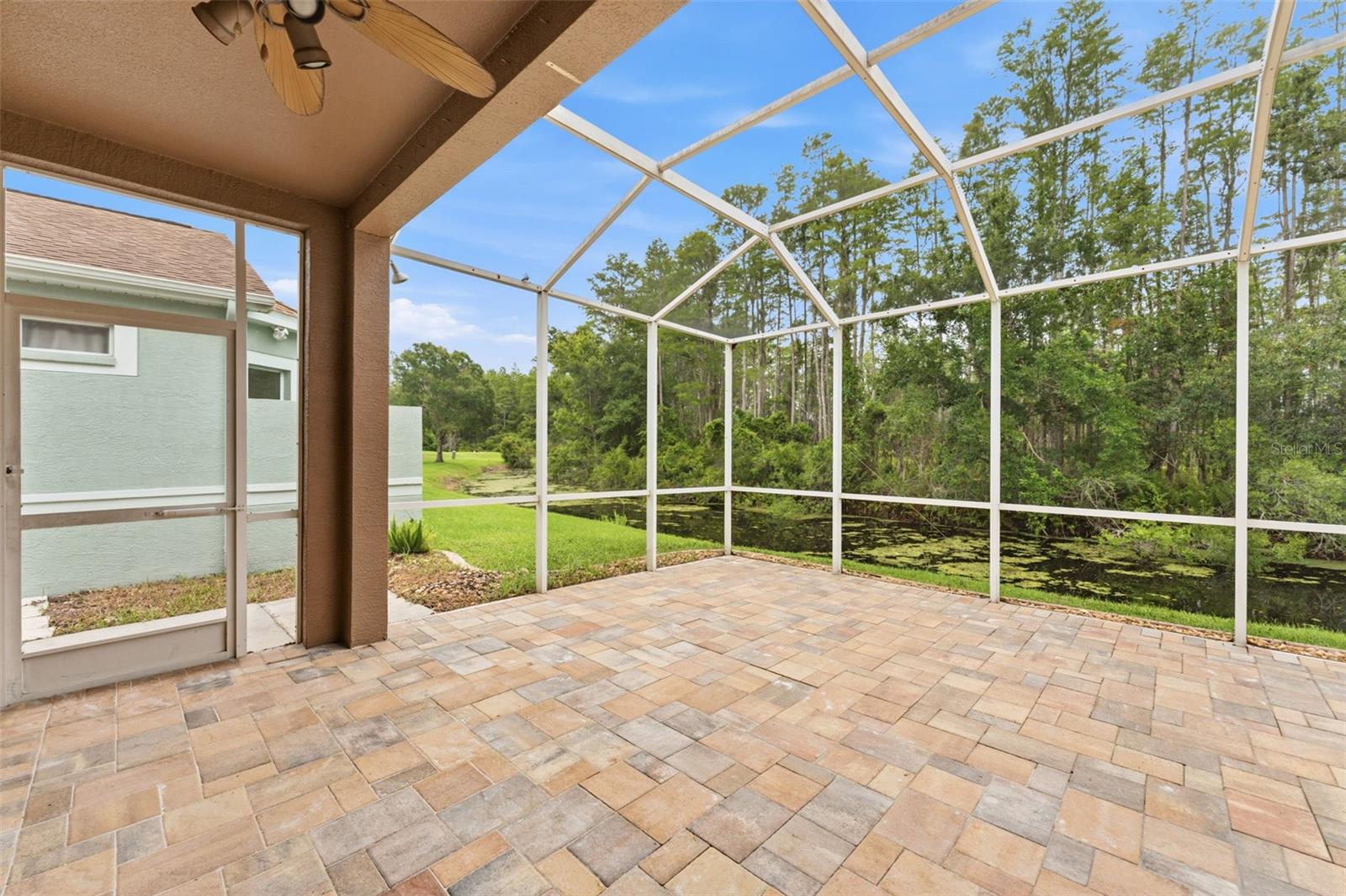 The covered lanai and extended screen patio for great space to enjoy the scenery!
