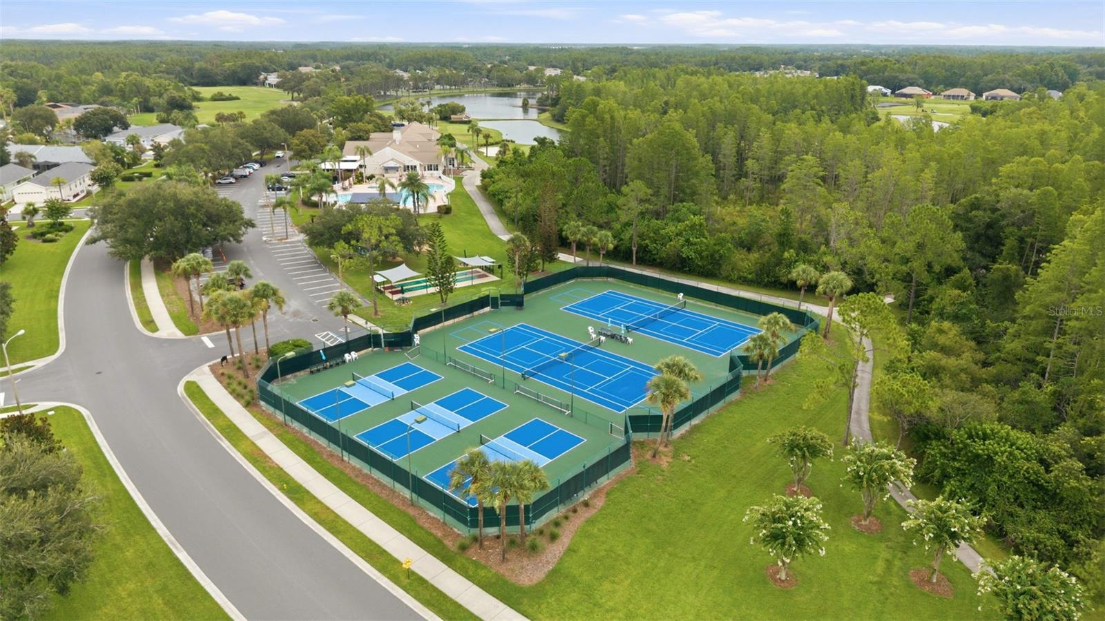 The community tennis and pickleball courts, used by many!