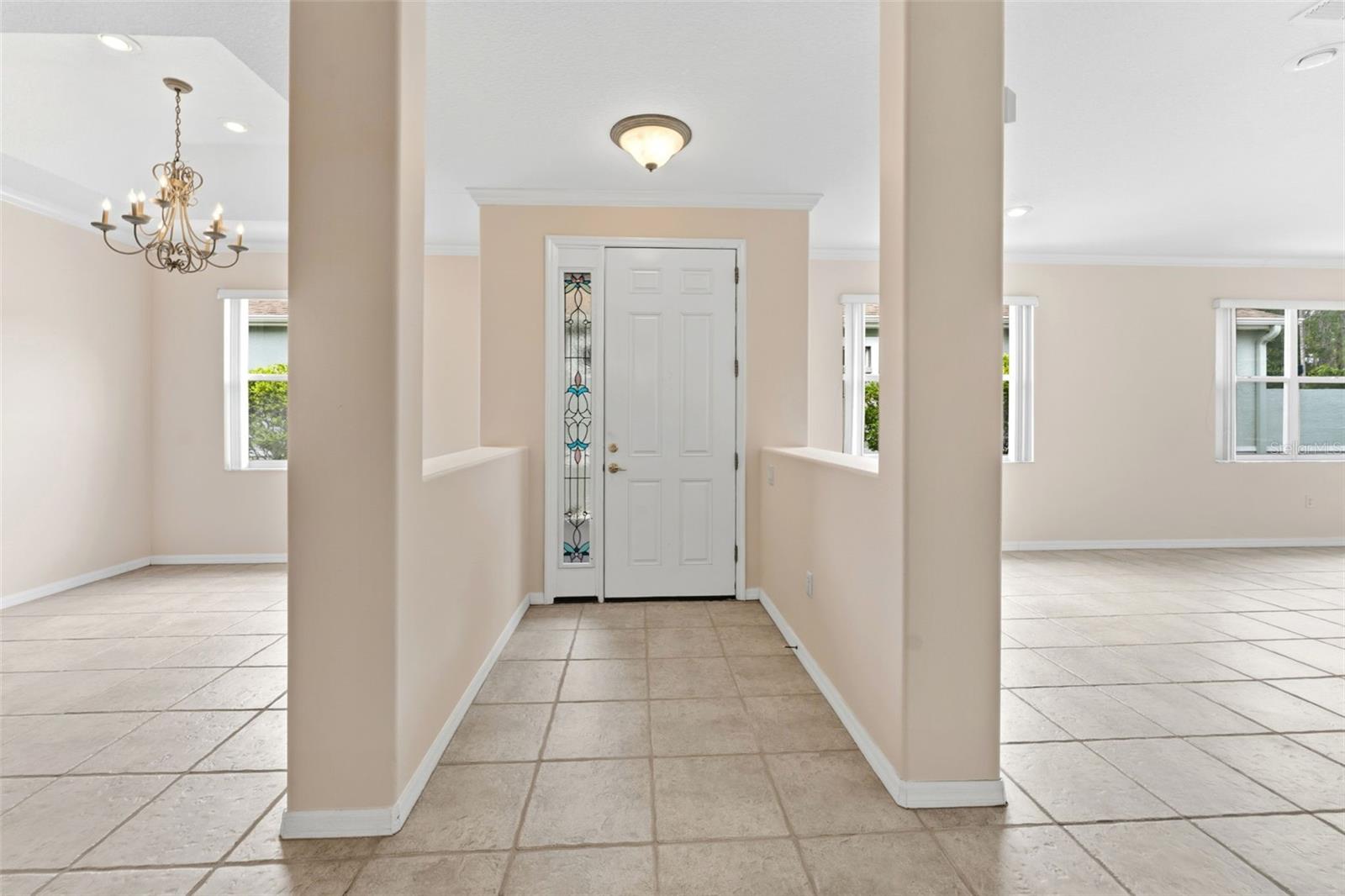 As you enter from your side patio you have your living room on the left and the dining room on the right!