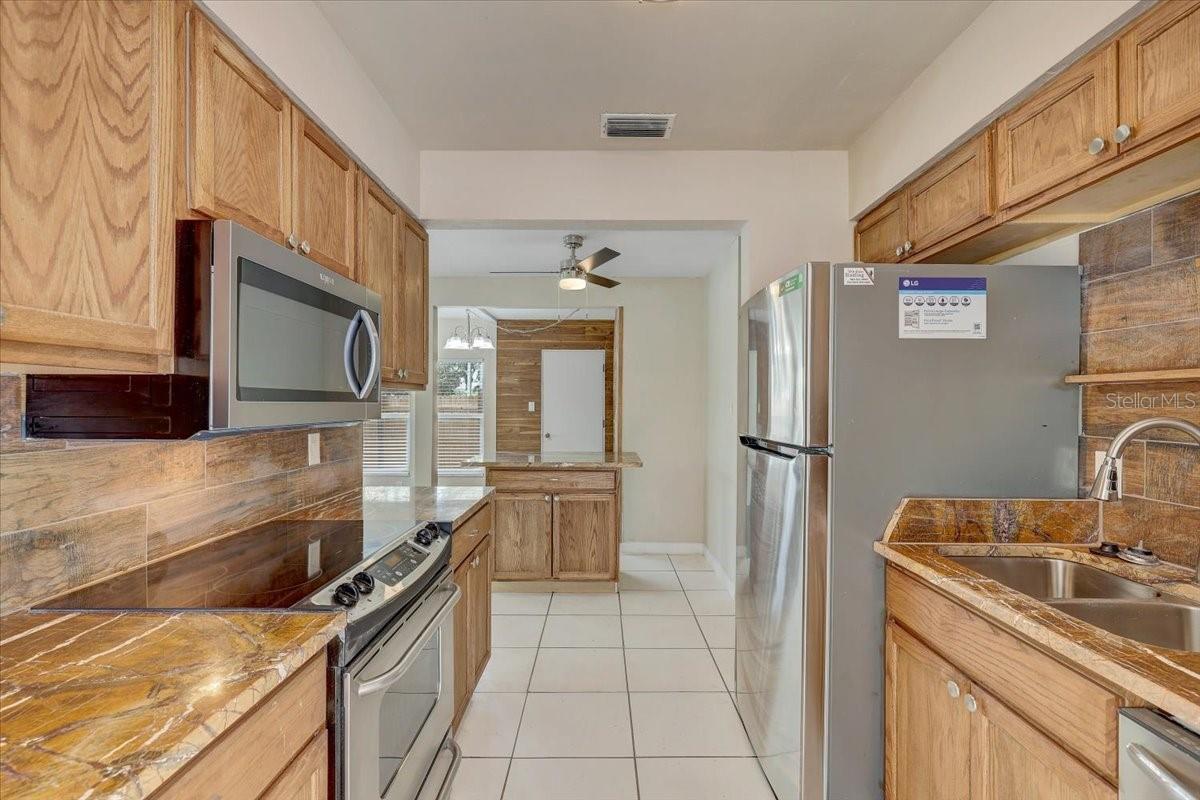 Kitchen with new stainless steel appliances
