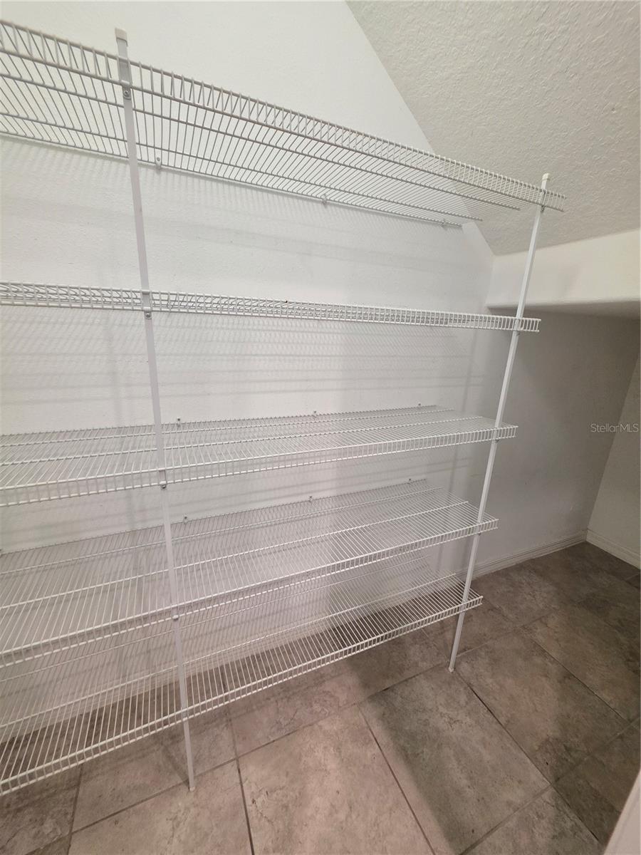 Large walk-in pantry.