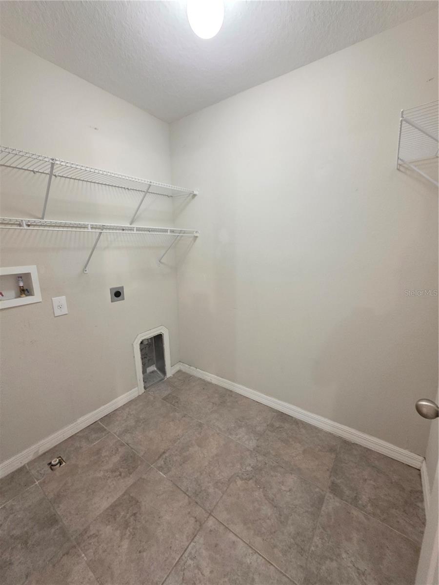 Laundry room upstairs.