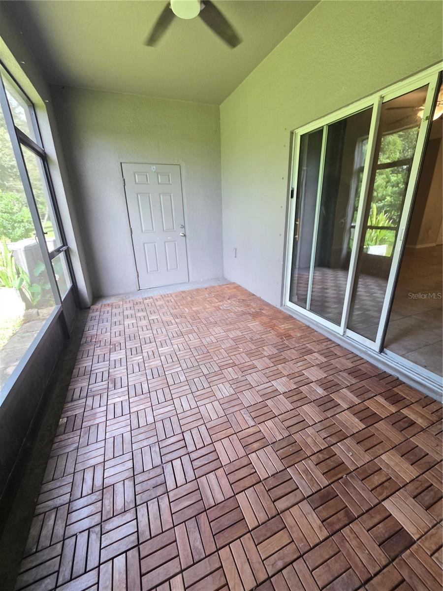 Large Screened Patio with enclosed storage room.