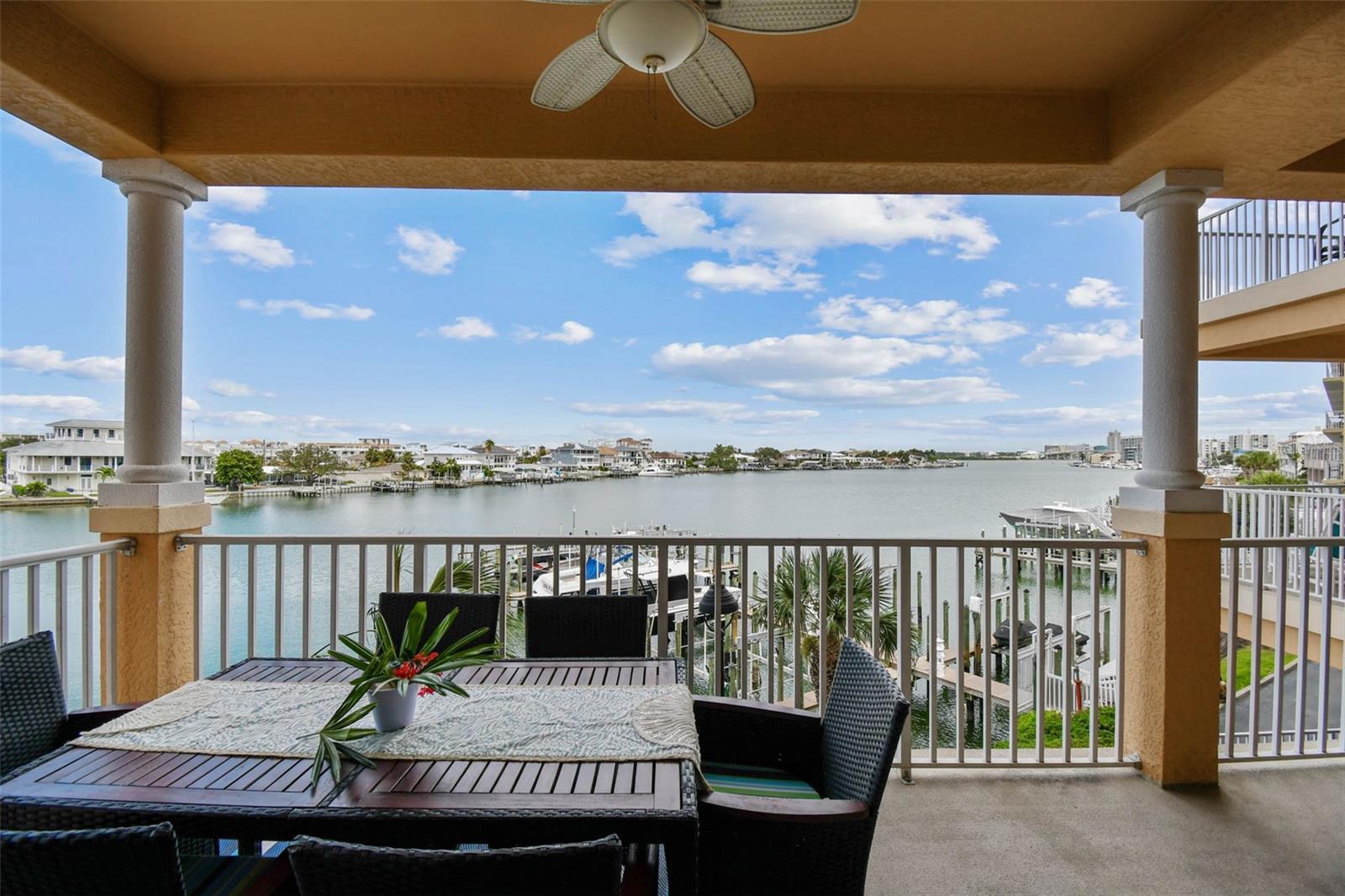 Generous patio spans the main living areas and primary bedroom