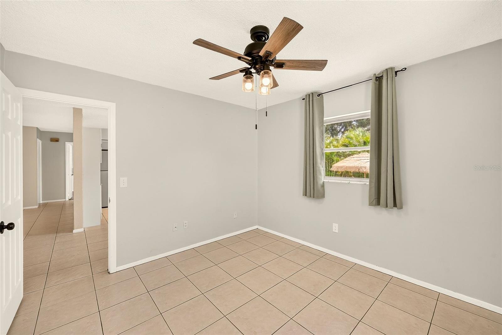 Primary Bedroom with pool view