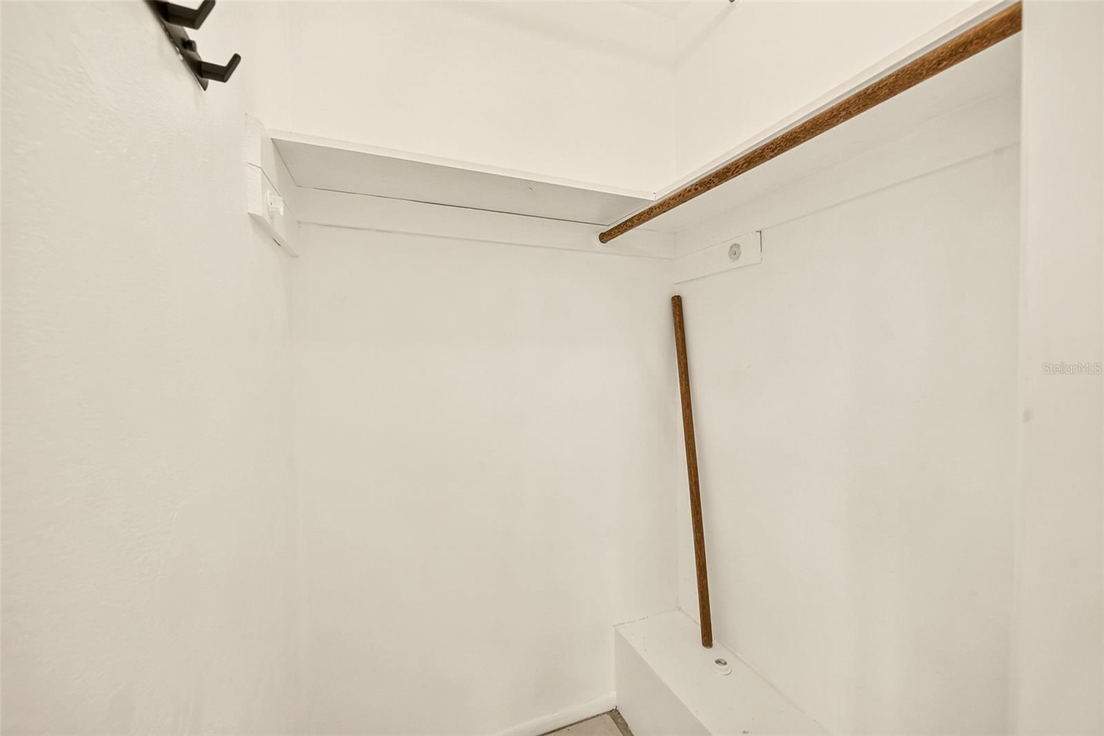 Primary Bedroom walk-in closet