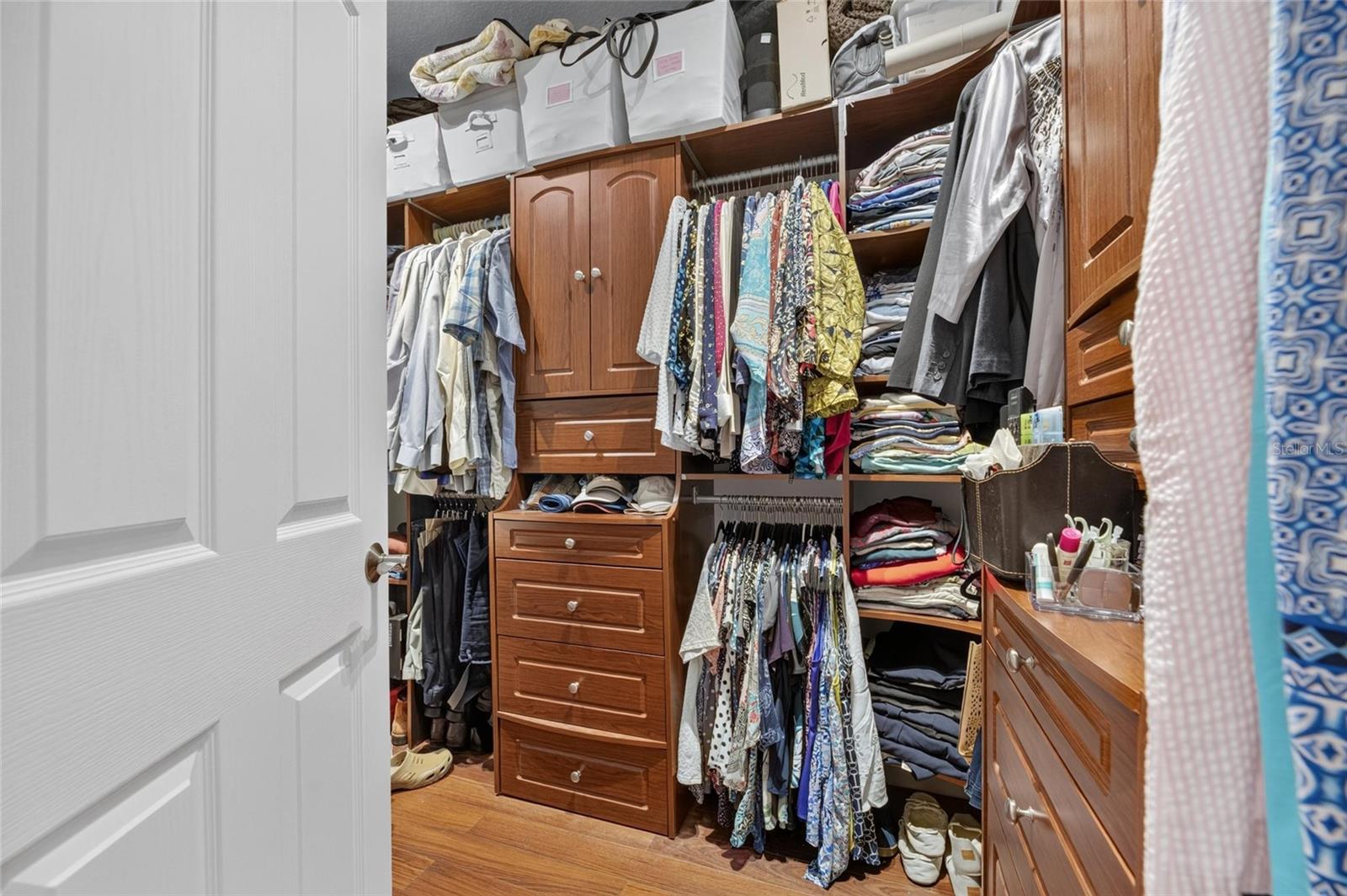 Master Bedroom Closet with Built-in Cabinetry