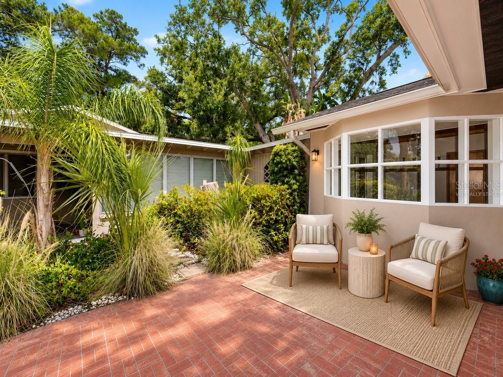 Virtually staged exterior front of Main House