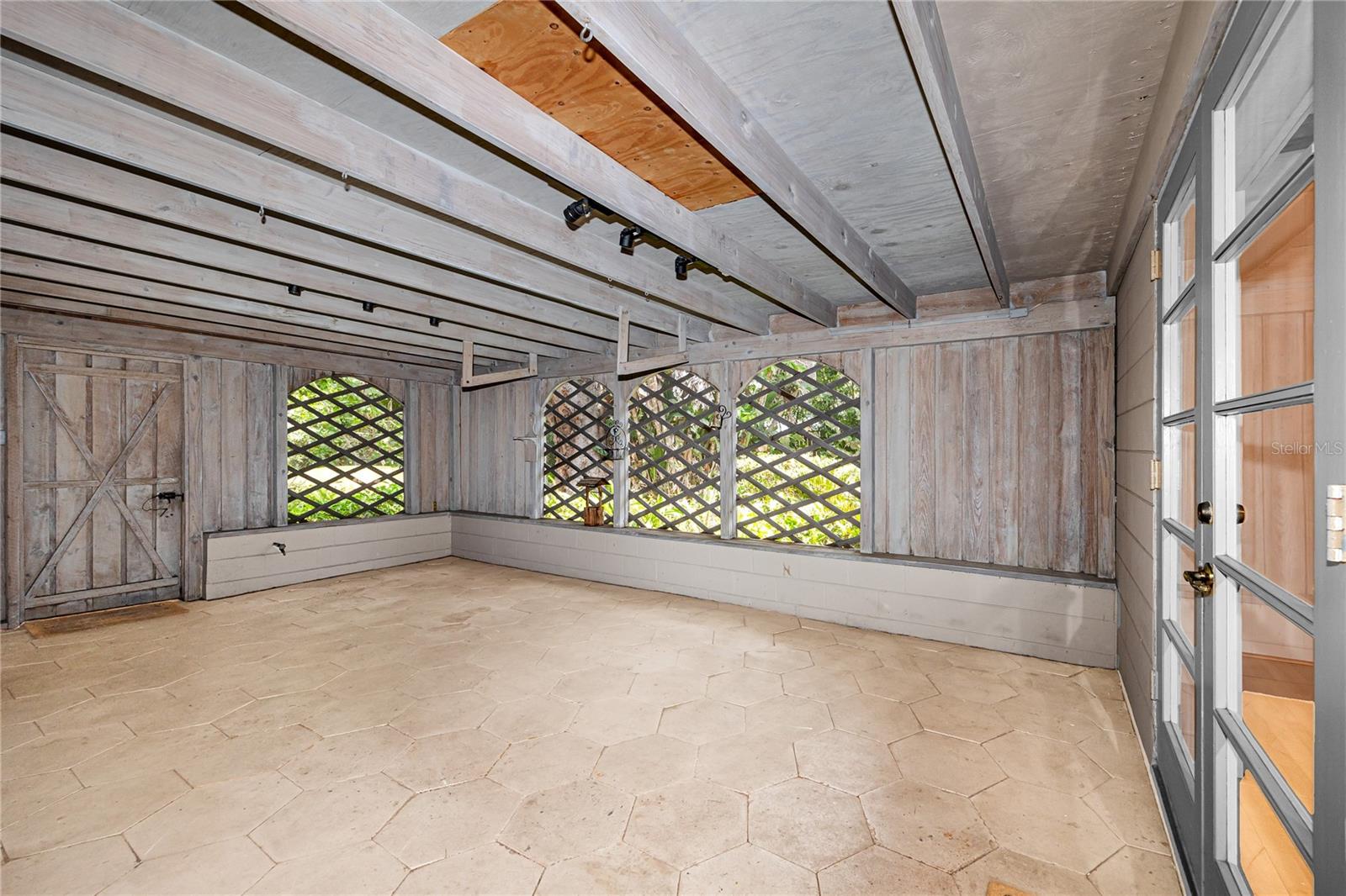 Covered and screened porch/breezeway between both houses 15x23