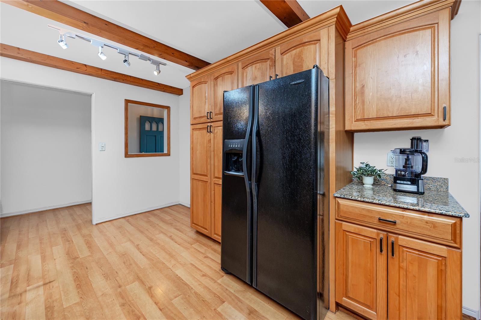 View from inside Main House kitchen toward entry