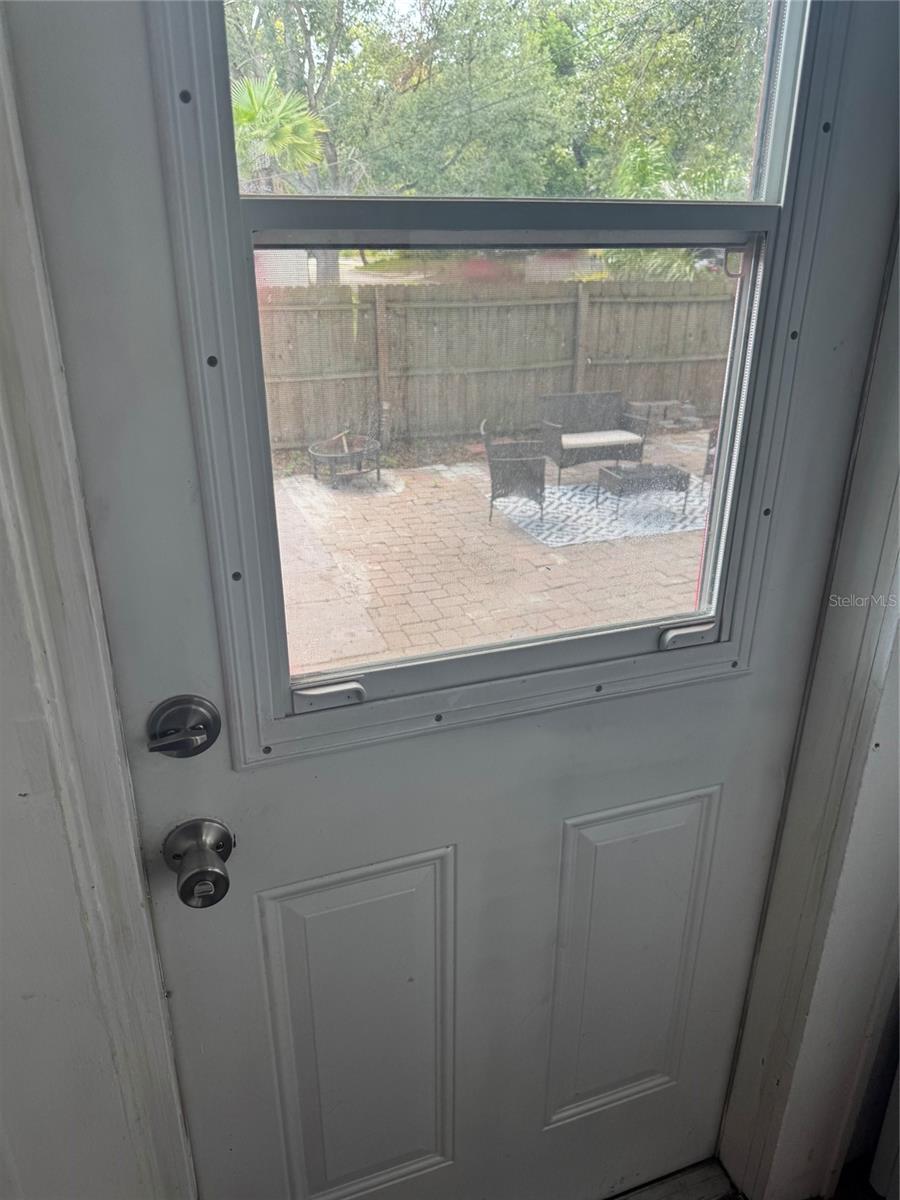 Laundry room door to backyard