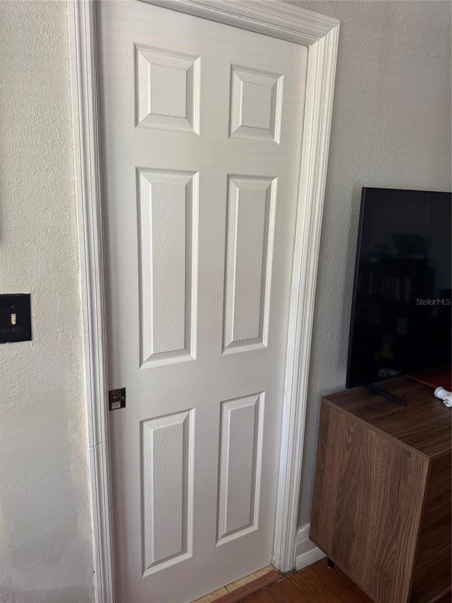 Pocket door to Primary bathroom