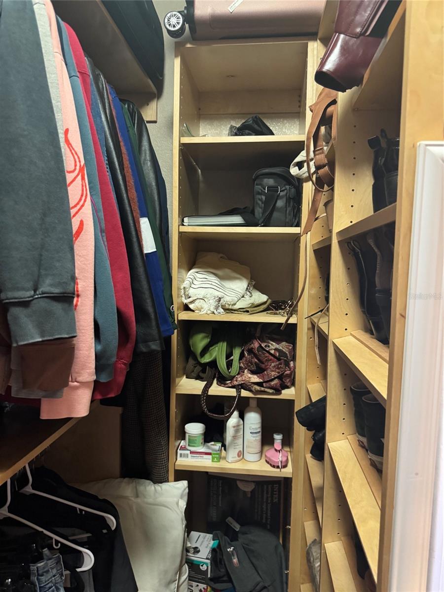 Primary bathroom / bedroom walk-in closet