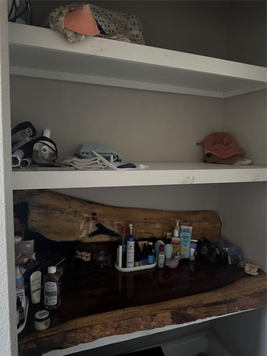 Updated second bathroom with shelves
