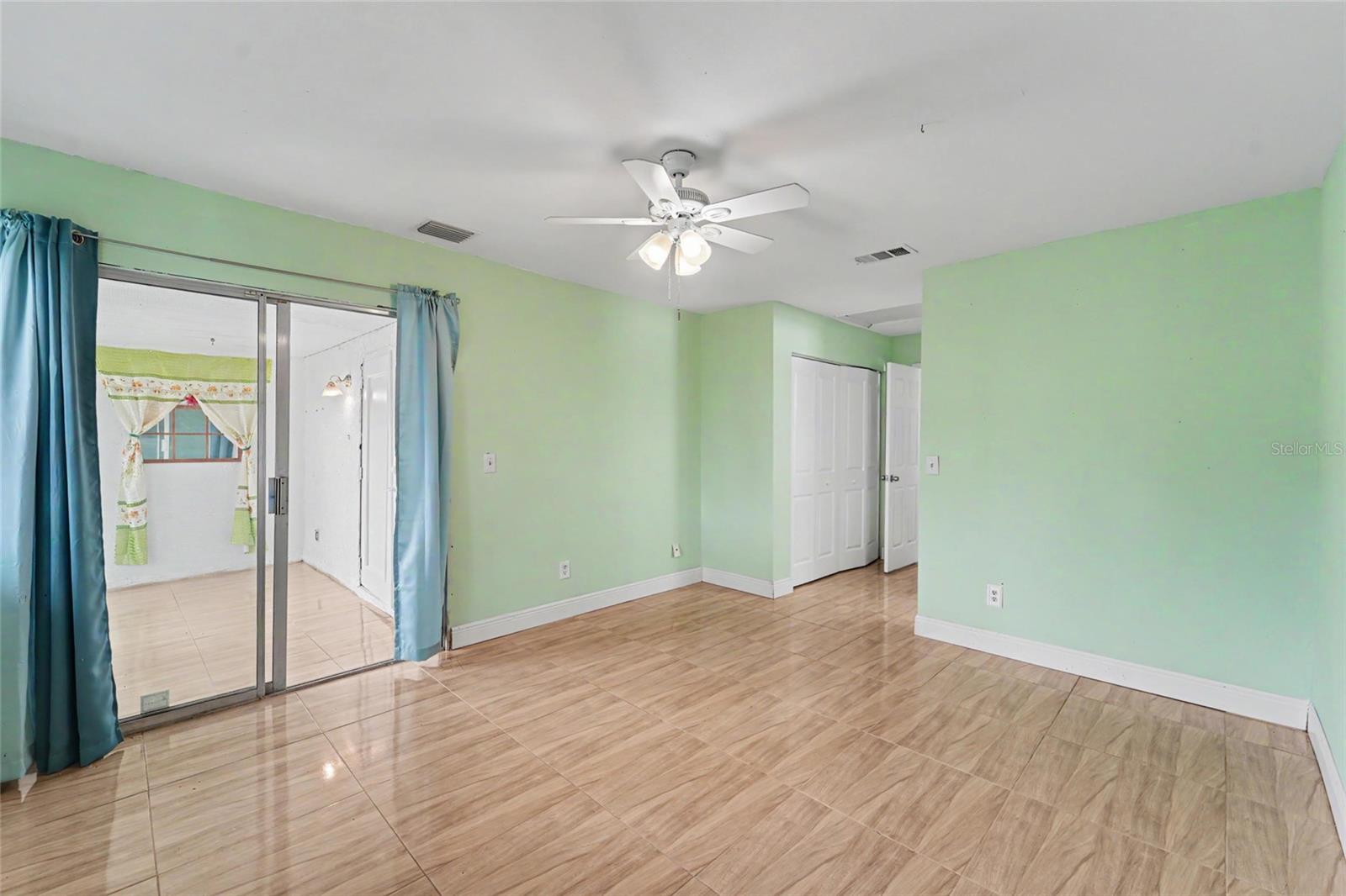 Primary Bedroom with entry to Sunroom