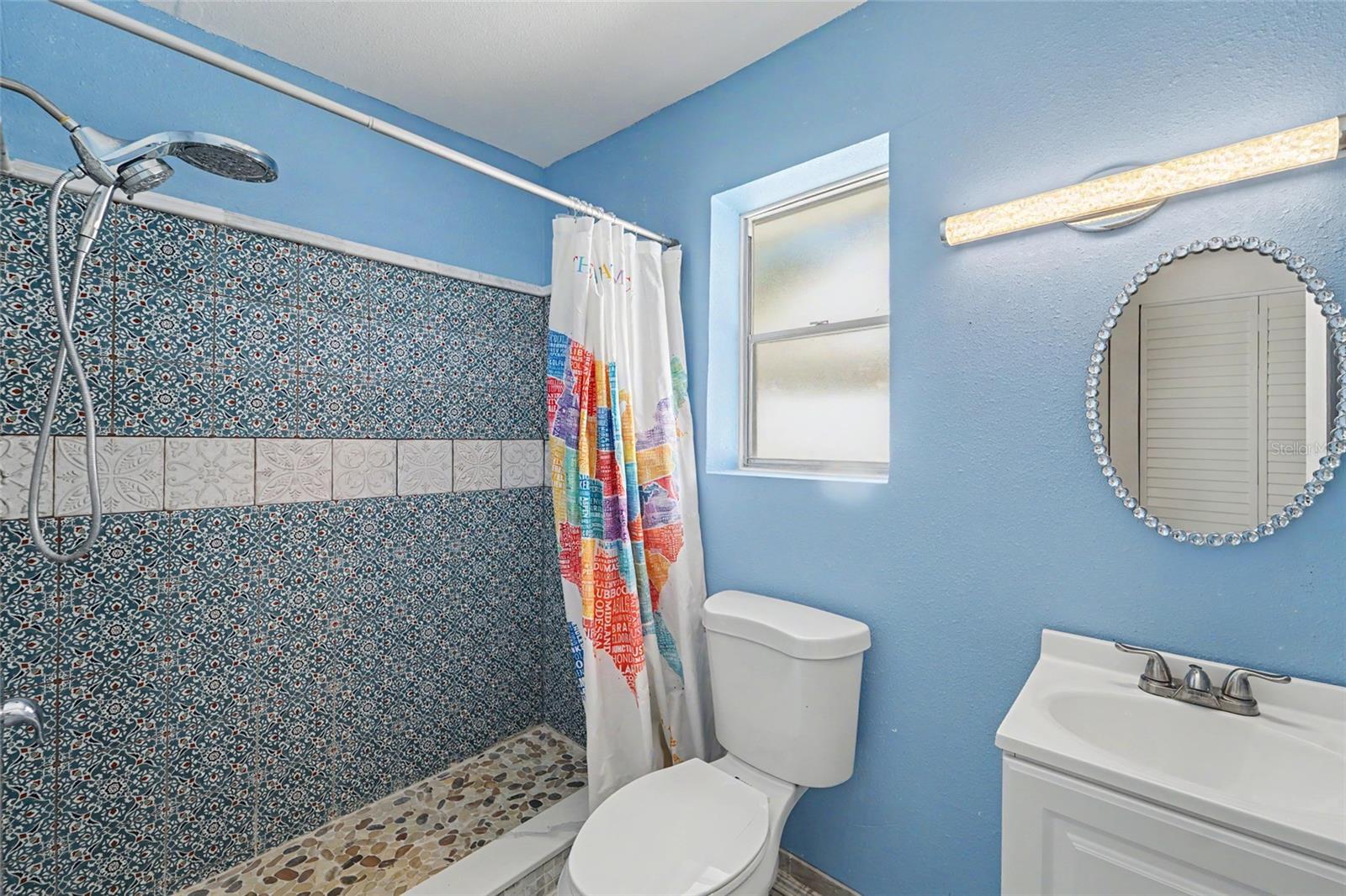 Hall Bathroom with Custom Tiled shower