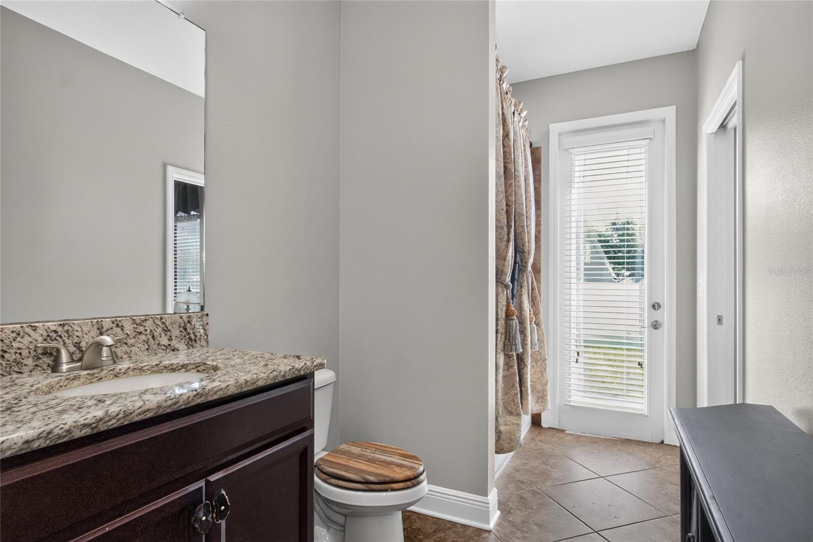 Guest Suite Bathroom with private door entrance/future pool door