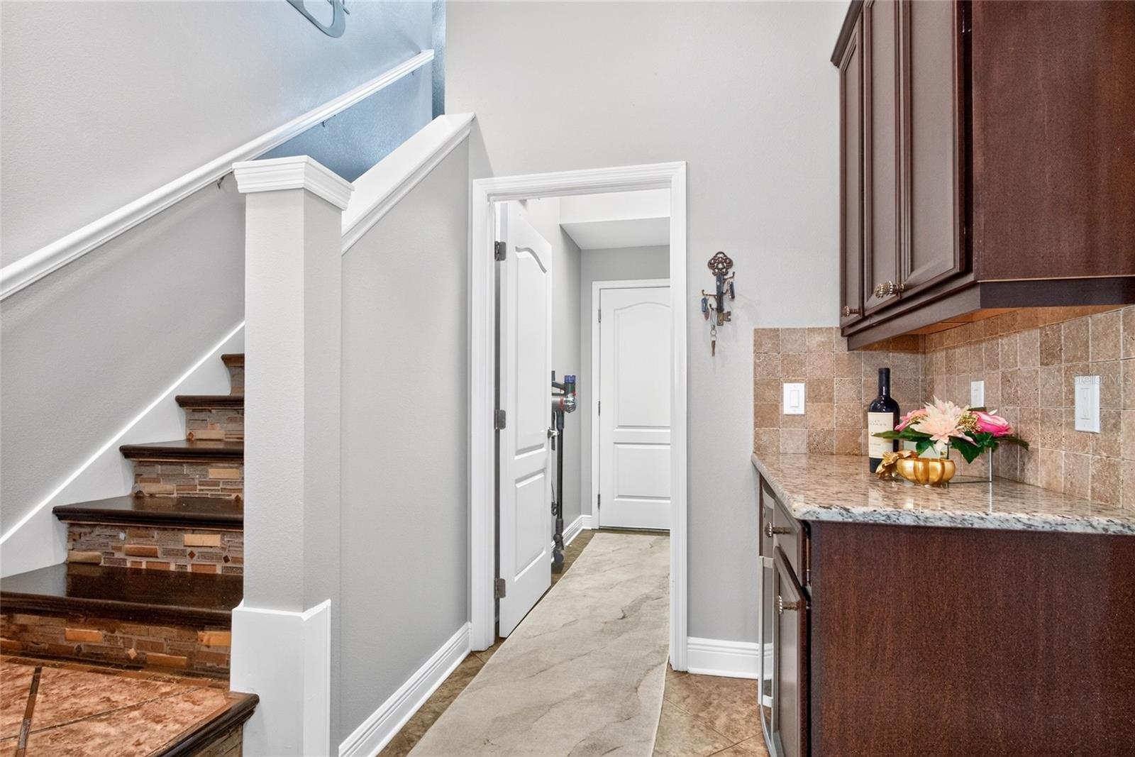 Custom tilework on bonus room stairs