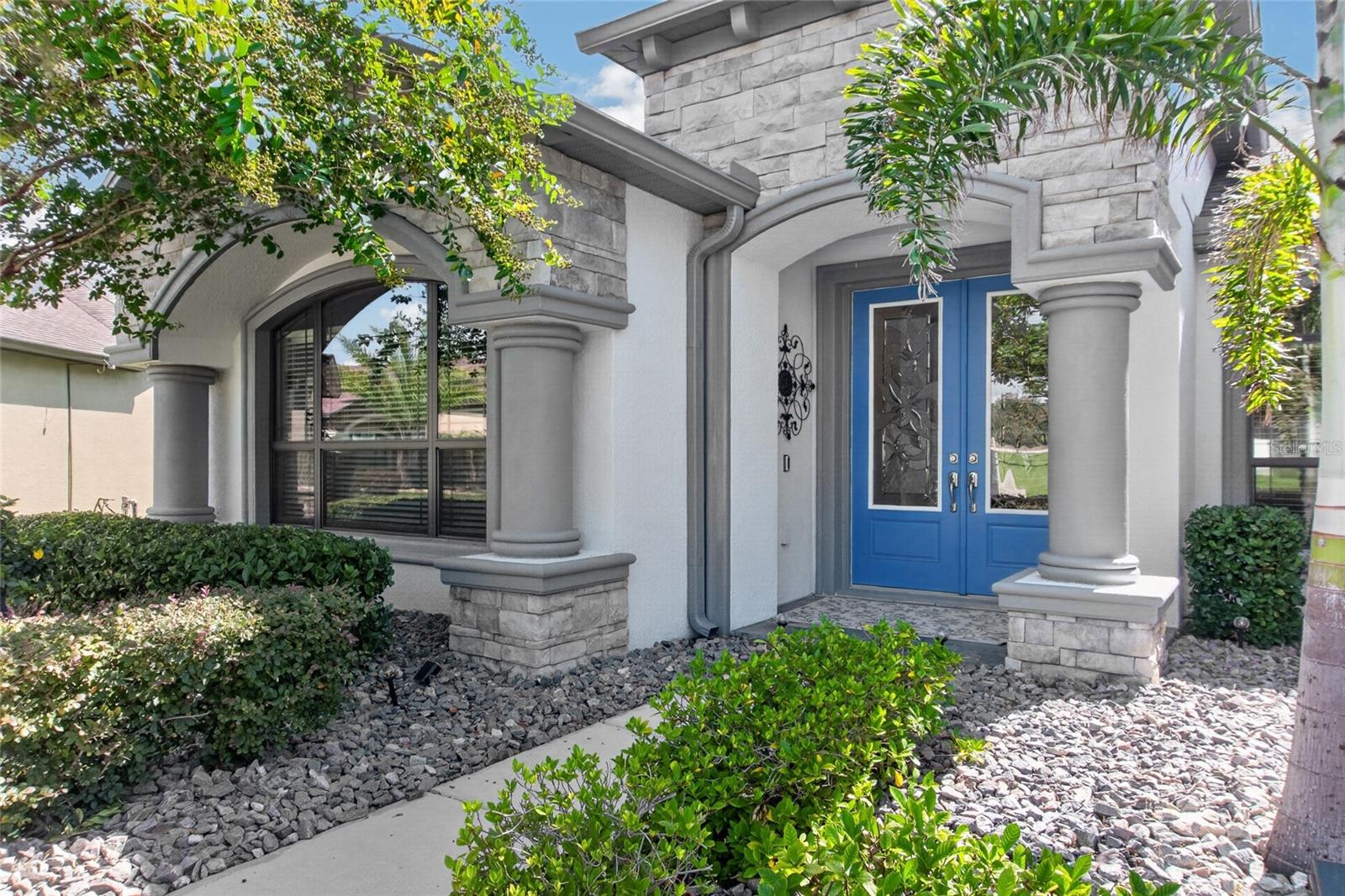 Front door with upgraded custom stone
