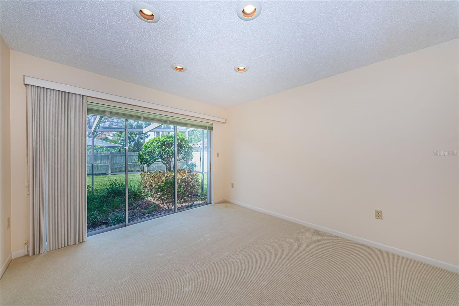 Dining room with slider to the screened porch