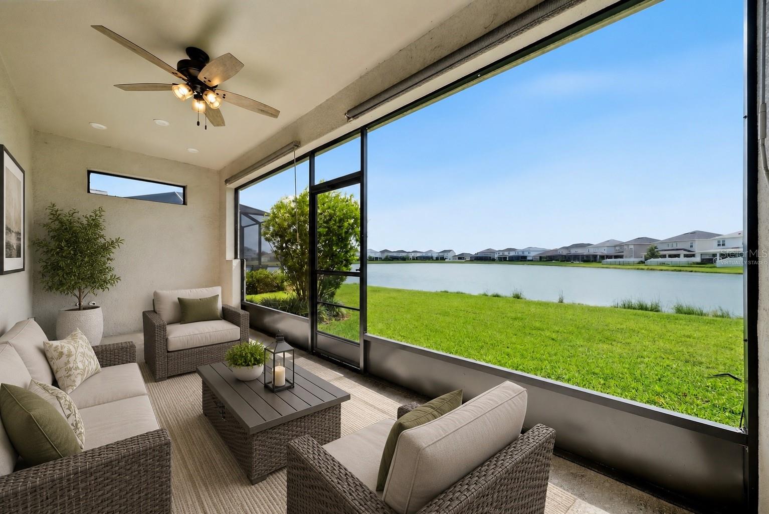 Large Screened-in Lanai great for get togethers or enjoying the Florida lifestyle! -Virtually Staged