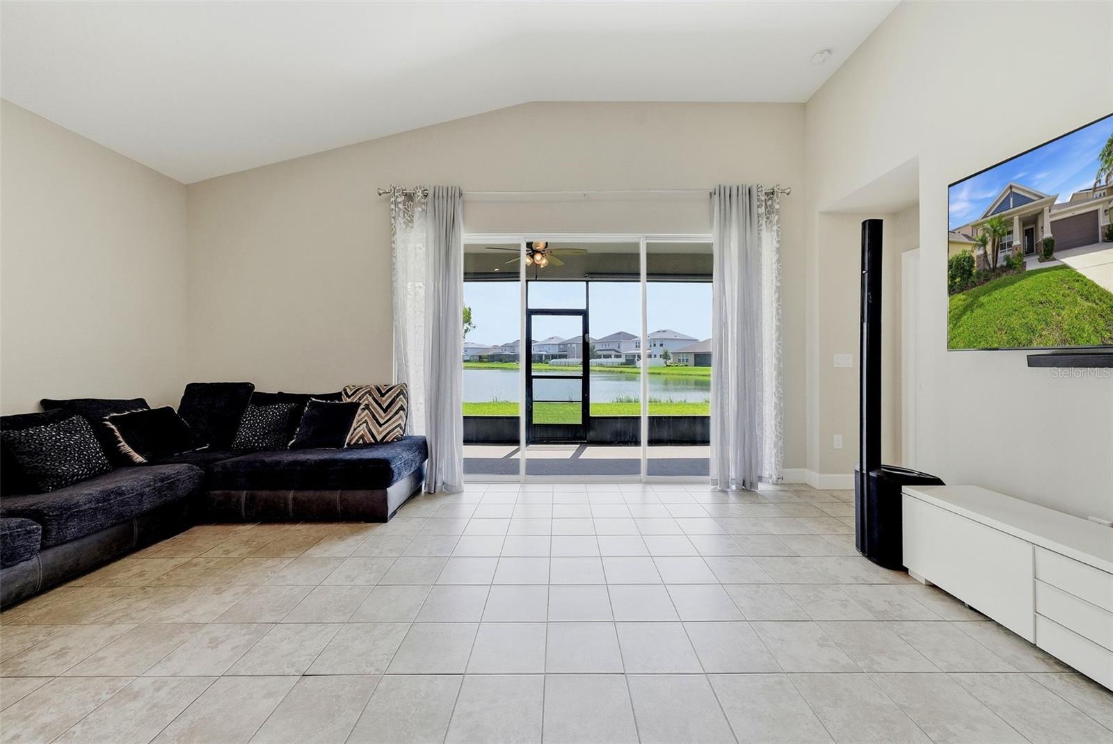 Large open flowing family room leading to the lanai