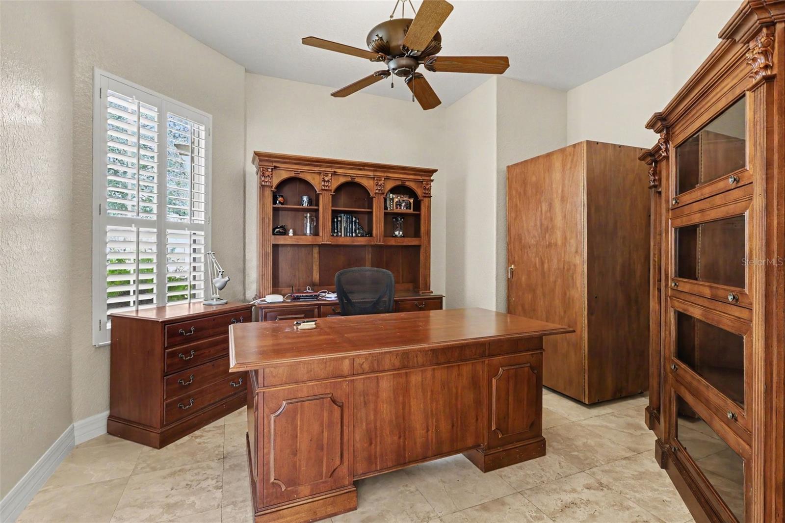 Office features travertine marble floor