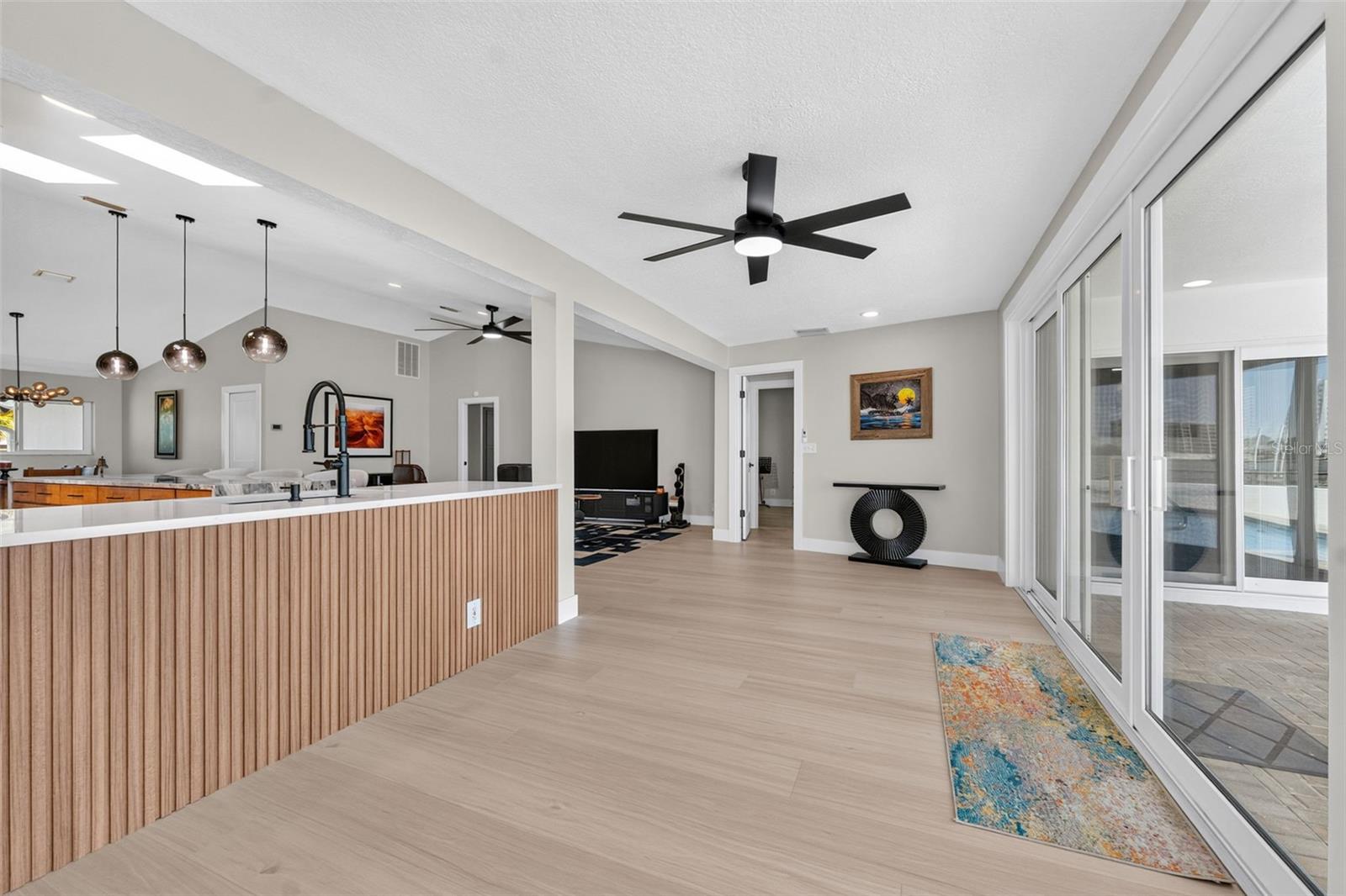 Bonus room with new ceiling fan offering flexible options for its use.