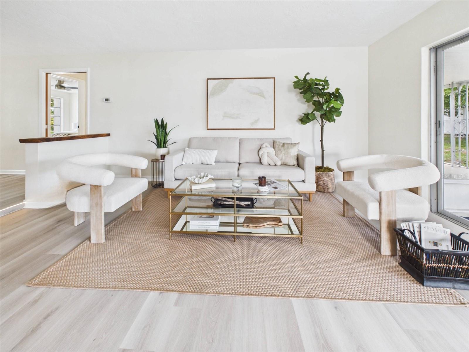 Great room with stunning light from the refurbished sliding glass doors