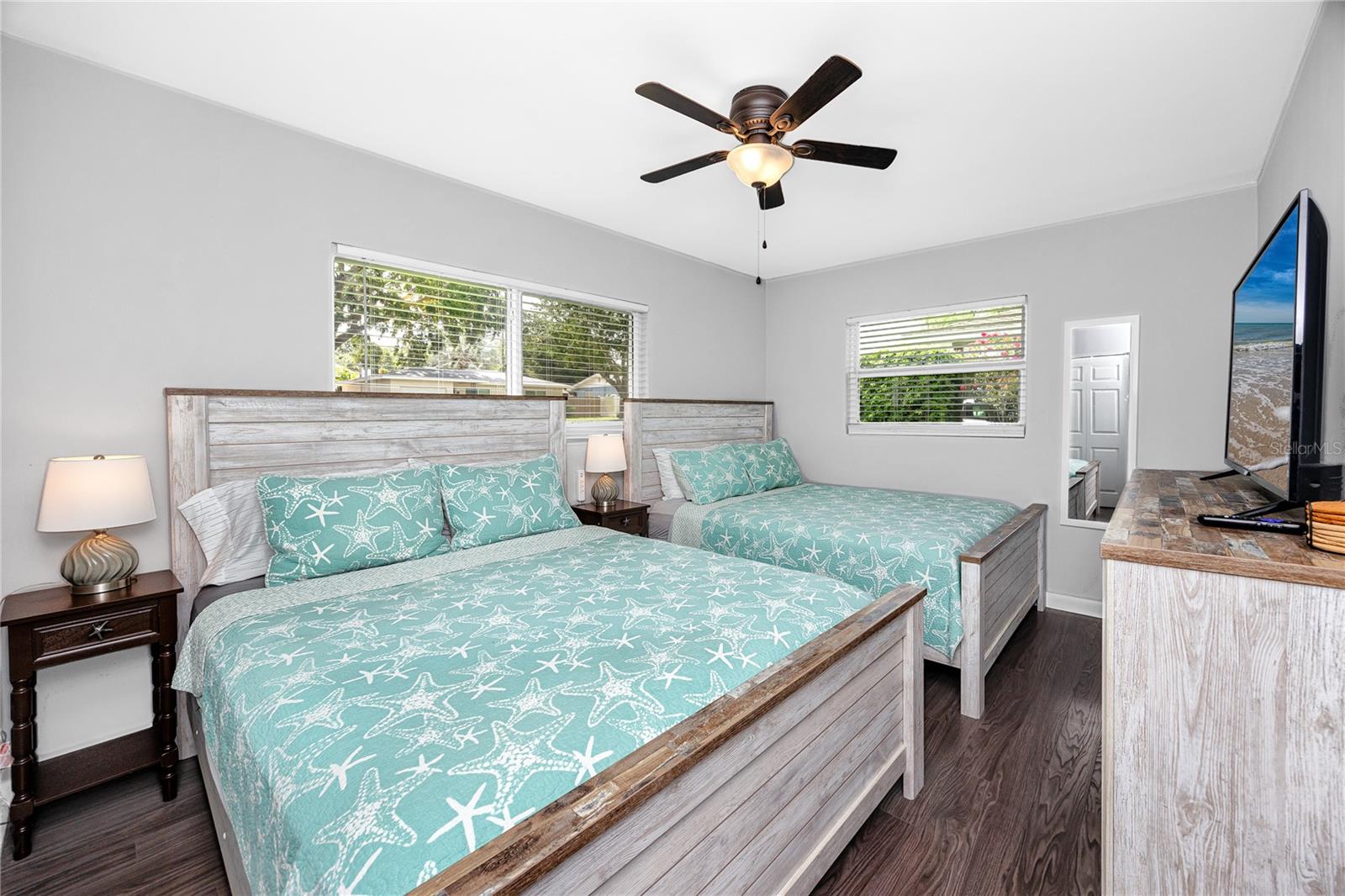 Primary Bedroom pictured with 2 Queen Beds