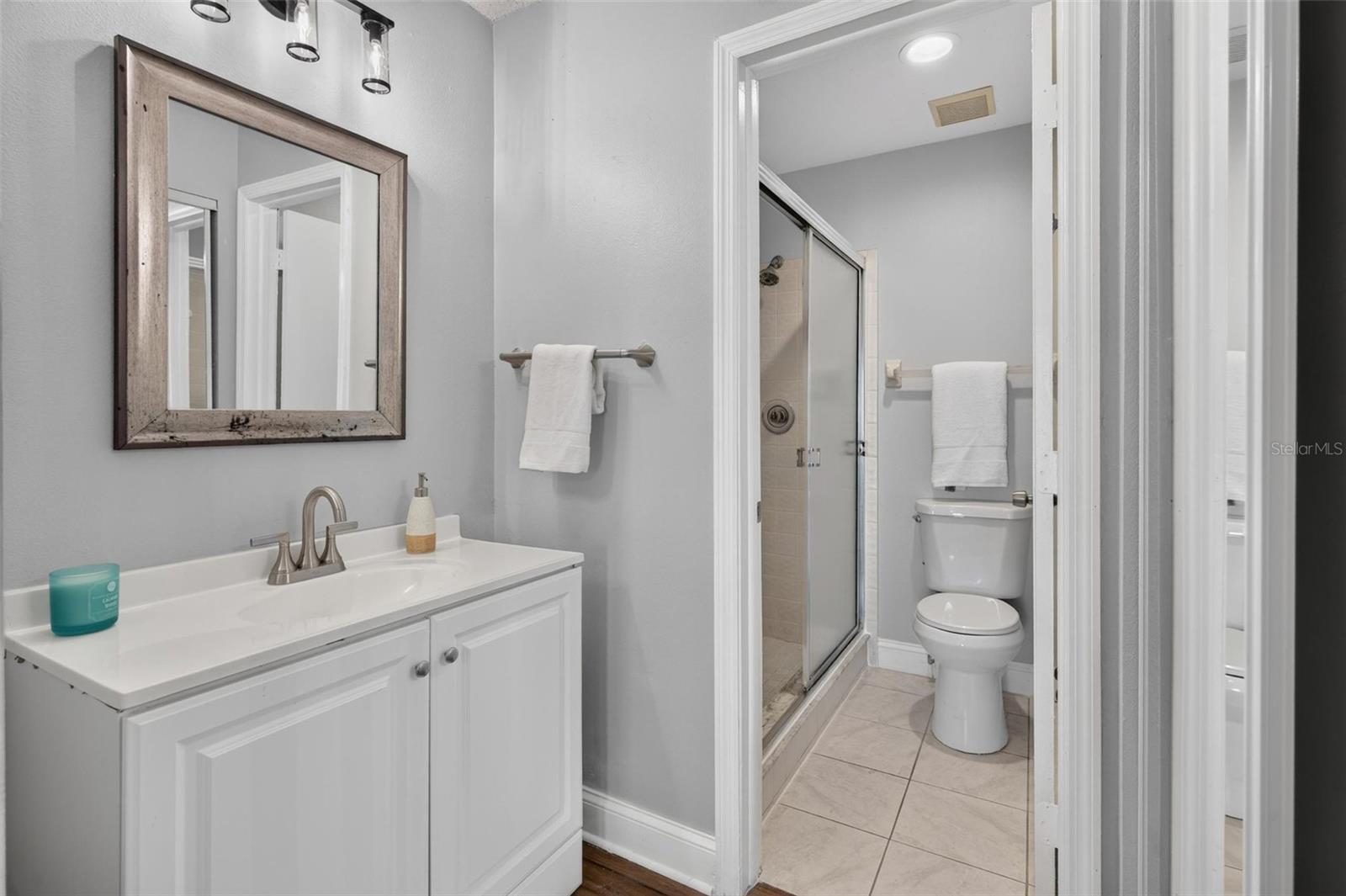 Primary bedroom bathroom entry