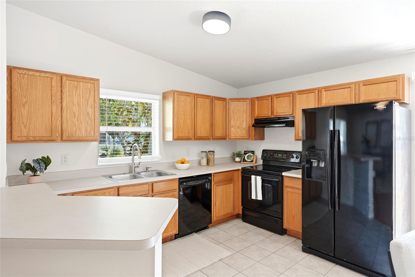 Ample cabinetry throughout the kitchen offers everyday storage and convenience.