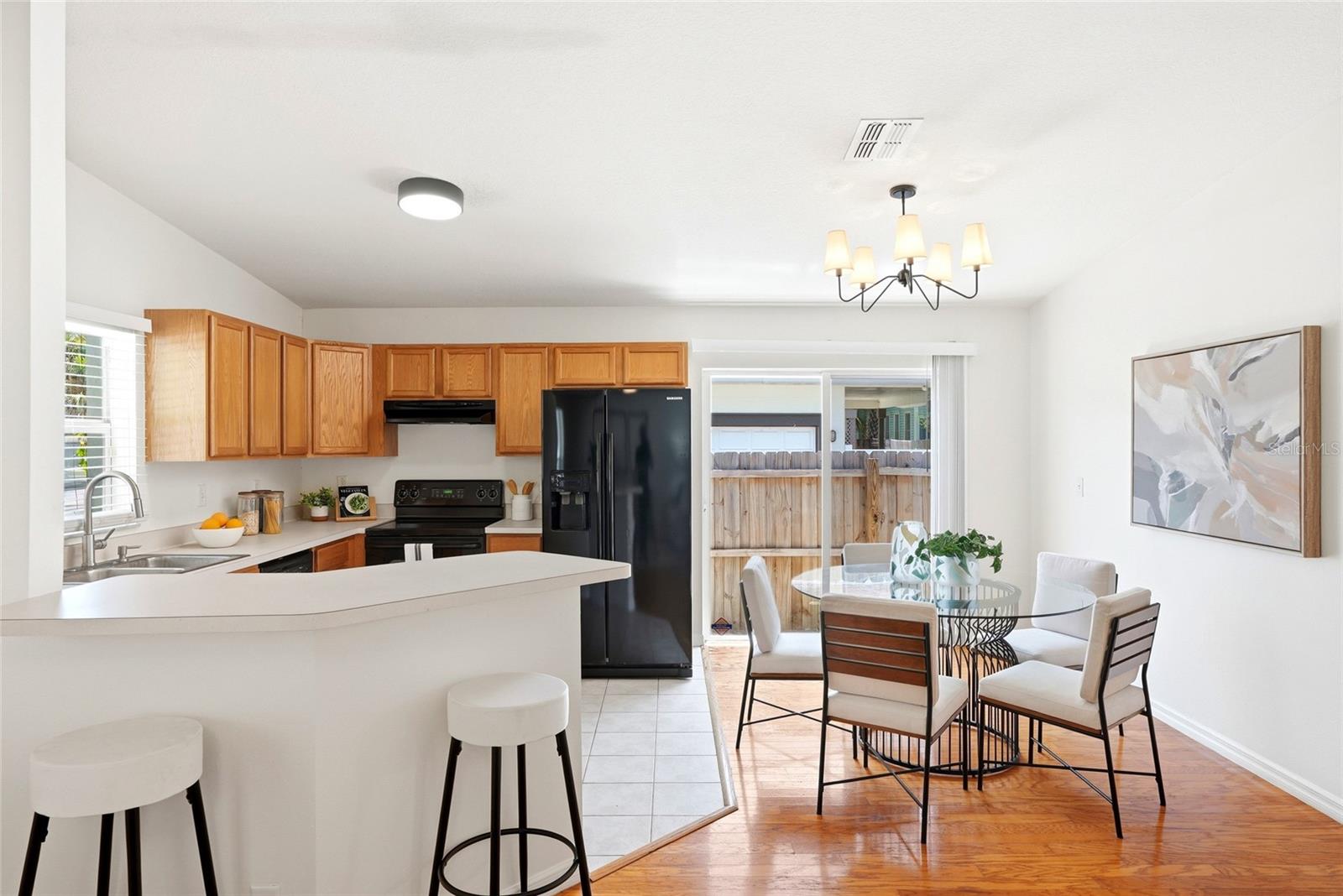 Plenty of counter space and cabinet storage make this kitchen as functional as it is inviting.