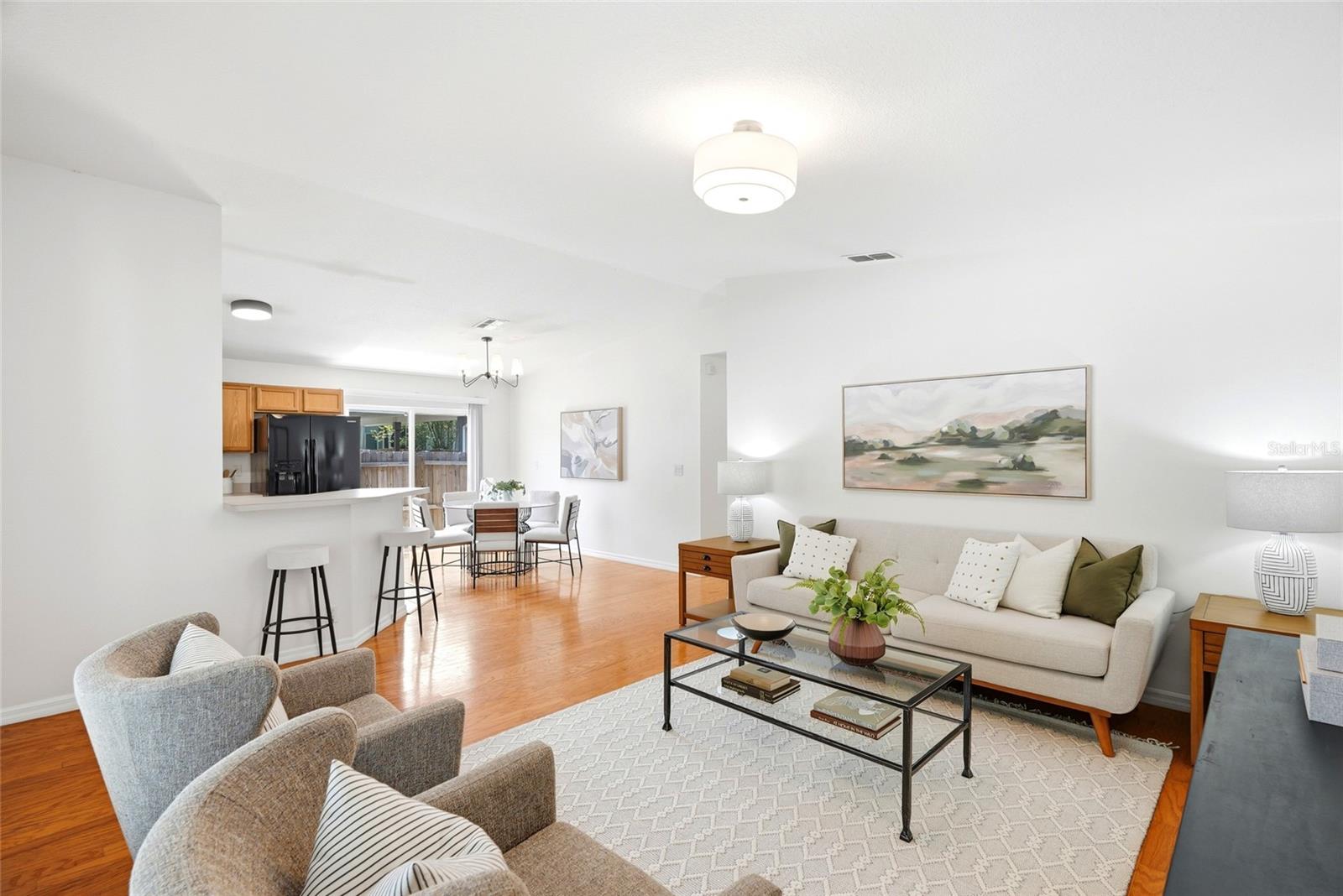 Soaring vaulted ceilings and an easy flow make this living area ideal for everyday living and entertaining.